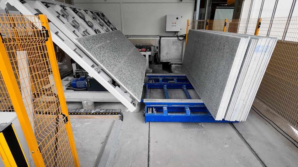 Sistema automatico per il carico delle lastre